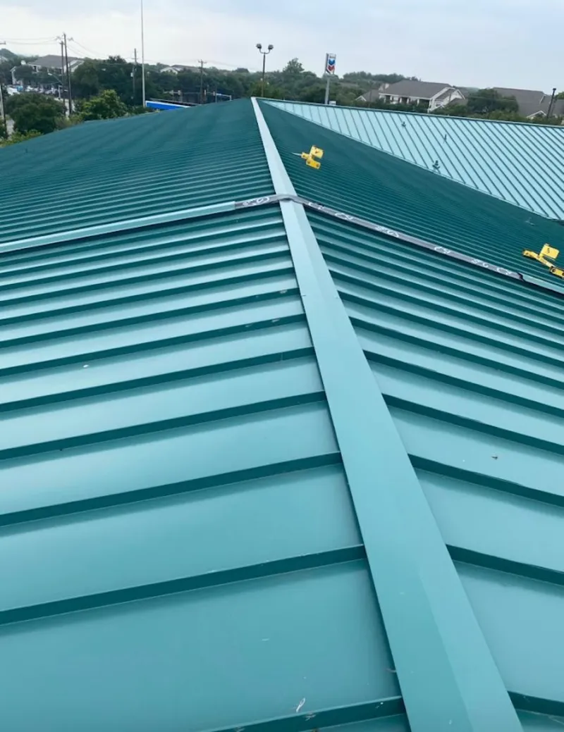 Green commercial metal roof ridge and valley for Metal Roof Repair in Centreville