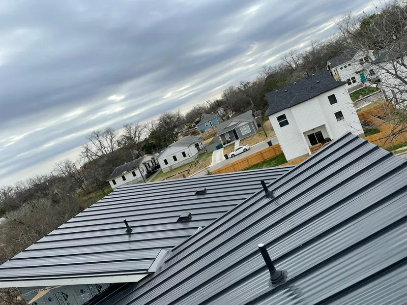 Standing seam metal roof panels with vents for Skylight Repair in Centreville